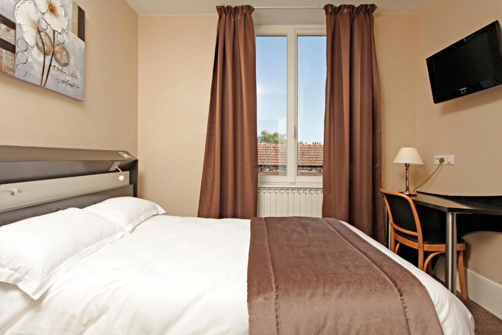 Logis Hotel Des Bourbons Montluçon Szoba fotó
